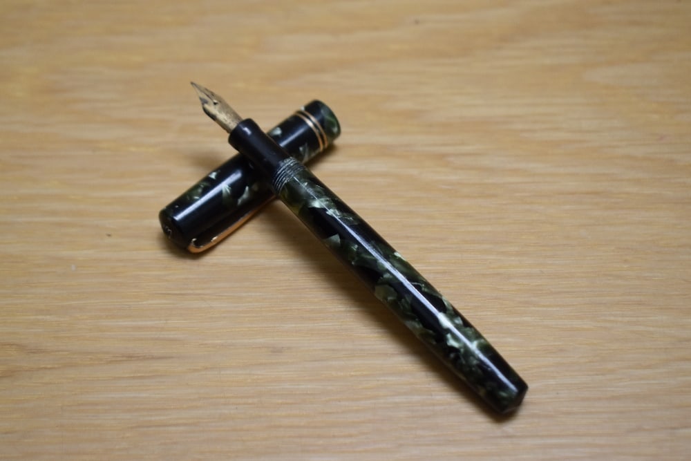A Mabie Todd & Co Swan self filler lever fill fountain pen in green black marble with two narrow (1 of 3)