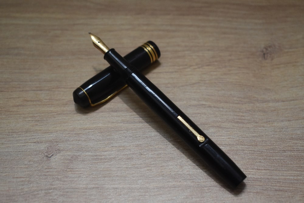 A Conway Stewart 388 lever fill fountain pen in black having Conway Stewart14ct gold nib: A Conway Stewart 388 lever fill fountain pen in black having Conway Stewart14ct gold nib