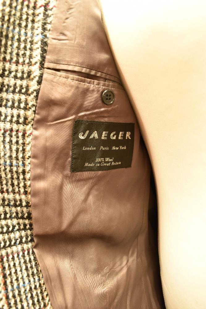 A 1980s single breasted coat in black and white 100% Pure New Wool houndstooth, flecked with threads (1 of 6)