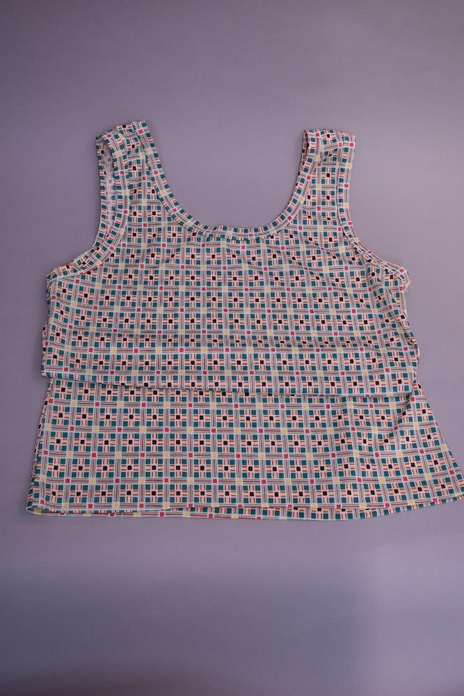 Two sets of 1970s short sleeved shirts with matching tank tops, in polyester jersey patterned all (1 of 4)