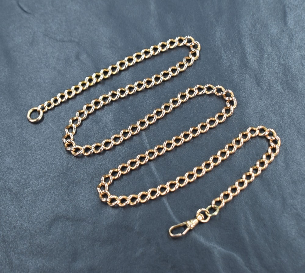 A 9ct rose gold curb link chain, approx 20' & 27g, some damage to clasp (1 of 1)