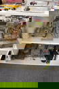 Two shelfs of plastic scale model kit built Military Tanks and Vehicles, some with remote