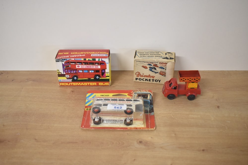 A Brimtoy Pocket Toy 9/541 tin plate and friction driven Mechanical Overhead Repair Lorry in: A Brimtoy Pocket Toy 9/541 tin plate and friction driven Mechanical Overhead Repair Lorry in original box along with two Lone Star Die-casts, Silver Jubilee Bus and Routemaster Bus, on bubble card and
