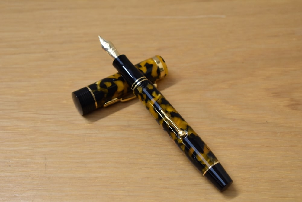 A Presentation boxed Conway Stewart Churchill lever fill fountain pen in honey noire with hallmarked (1 of 3)