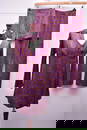 Two 1960s-1970s costume outfits and complimentary boots. A 1960s four-piece disco set in brown and