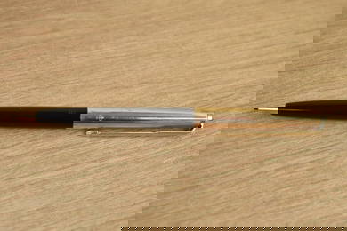A Parker 61 propelling pencil in black with rolled gold cap
