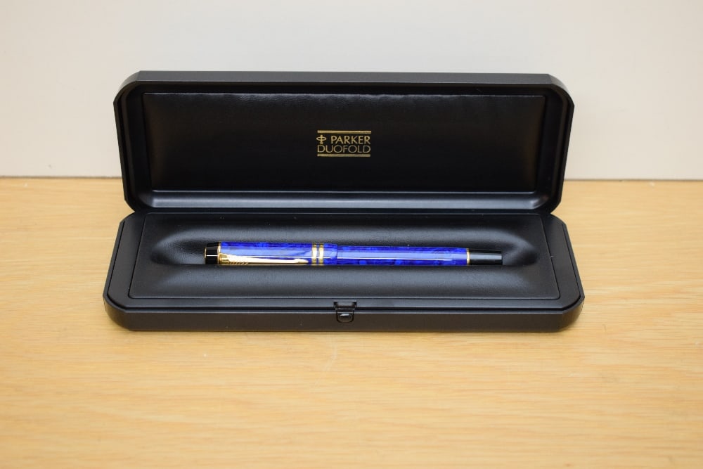 A boxed Parker Duofold International converter fill fountain pen in Lapis lazulii with gold trim (1 of 3)