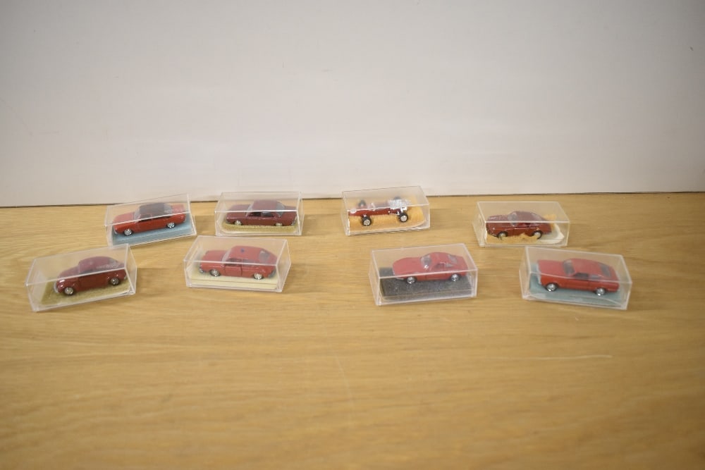 Eight Schuco Die-casts, 817 Audi 100LS, 301852 Audi 100GL, 824 VW 411818 VW 1300L813 Porsche 911S,: Eight Schuco Die-casts, 817 Audi 100LS, 301852 Audi 100GL, 824 VW 411818 VW 1300L813 Porsche 911S, 840 Ferrari Formel 2, 814 Opel GT1900 and 301837 Ford Taunus GT Coupe, all red, all in plastic displa