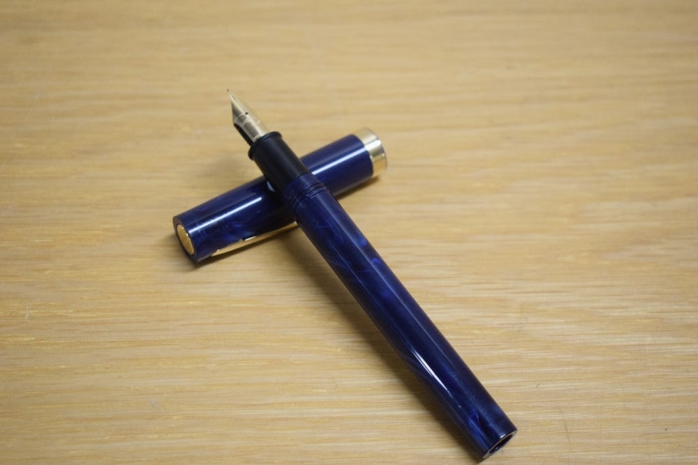 A Sheaffer No Nonsense cartridge fill fountain pen in blue having Sheaffer M made in USA nib: A Sheaffer No Nonsense cartridge fill fountain pen in blue having Sheaffer M made in USA nib