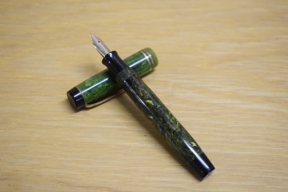 A Parker Duofold Junior button fill fountain pen in Jade Green with two bands to the cap having (1 of 3)