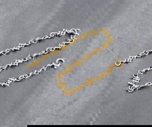 An 18ct gold fancy link bracelet, having infinity style links with beaded links, 16.5cm, 4.6g