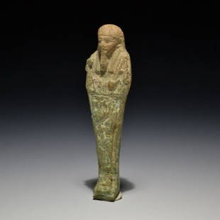 AN EGYPTIAN USHEBTI WITH HIEROGLYPHIC TEXT: AN EGYPTIAN USHEBTI WITH HIEROGLYPHIC TEXT Egyptian / Late Period, ca. 664-332