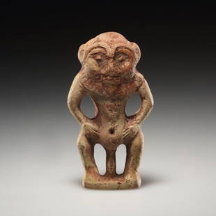 AN EGYPTIAN TERRACOTTA FIGURE OF BES WITH LION HEAD: AN EGYPTIAN TERRACOTTA FIGURE OF BES WITH LION HEAD Egyptian / 3rd – 1st cent.