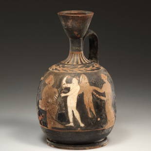 AN ATTIC RED-FIGURE LEKYTHOS ATTRIBUTED TO THE MEIDIAS PAINTER: AN ATTIC RED-FIGURE LEKYTHOS ATTRIBUTED TO THE MEIDIAS PAINTERAttic / 420–400 B.C. / Clay / H = 14 cm (5 33/64 in)Red figural lekythos on a moulded ring foot. Attributed to the Meidias Painter. On