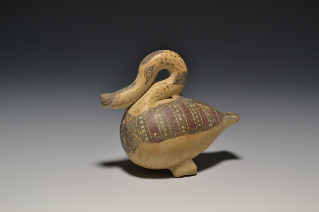 AN ETRUSCAN ANTHROPOMORPHE ASKOS IN THE SHAPE OF A DUCK (1 of 6)