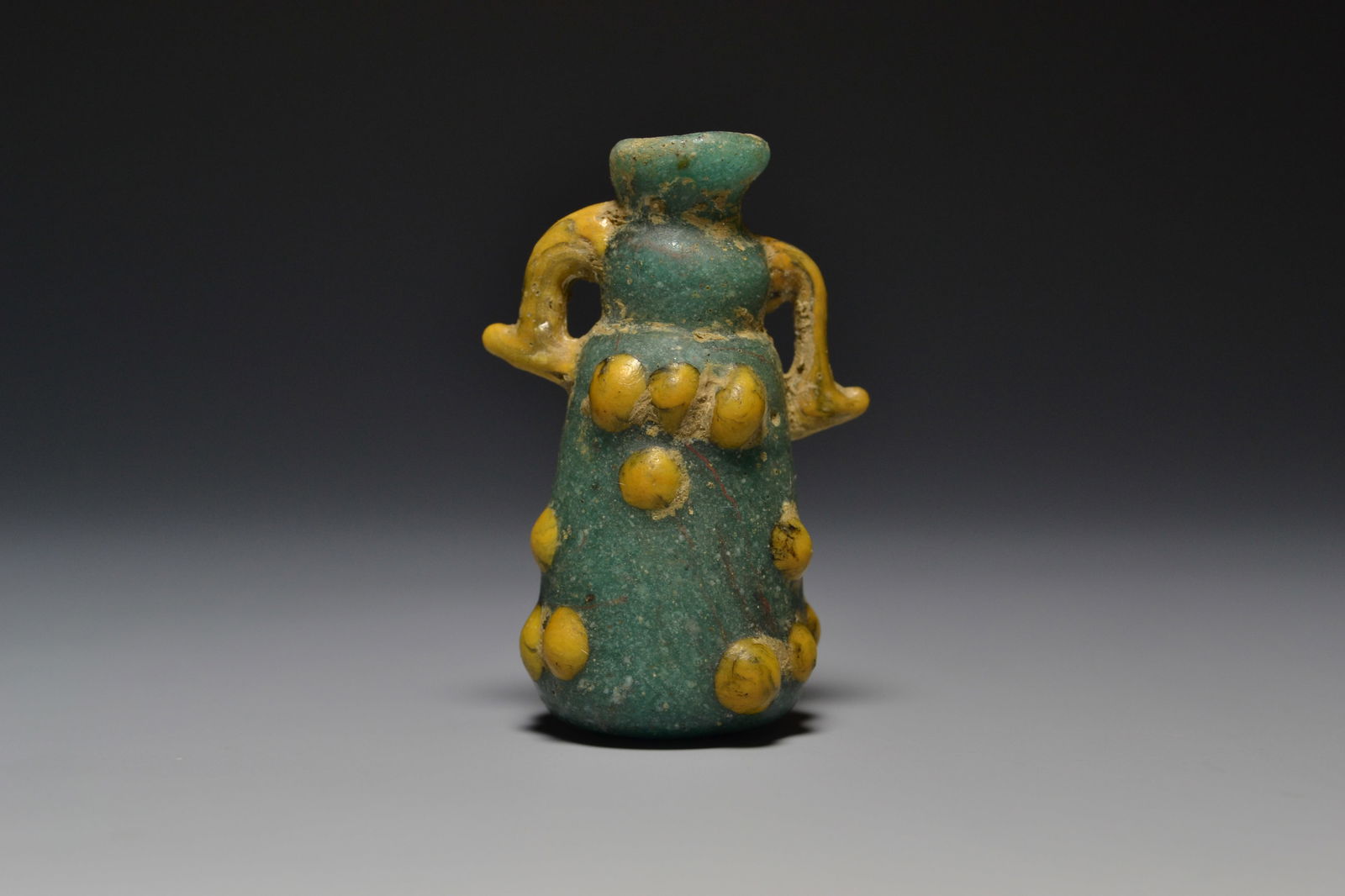 PHOENICIAN TWO HANDLED BLUE AND YELLOW GLASS BOTTLE (1 of 3)