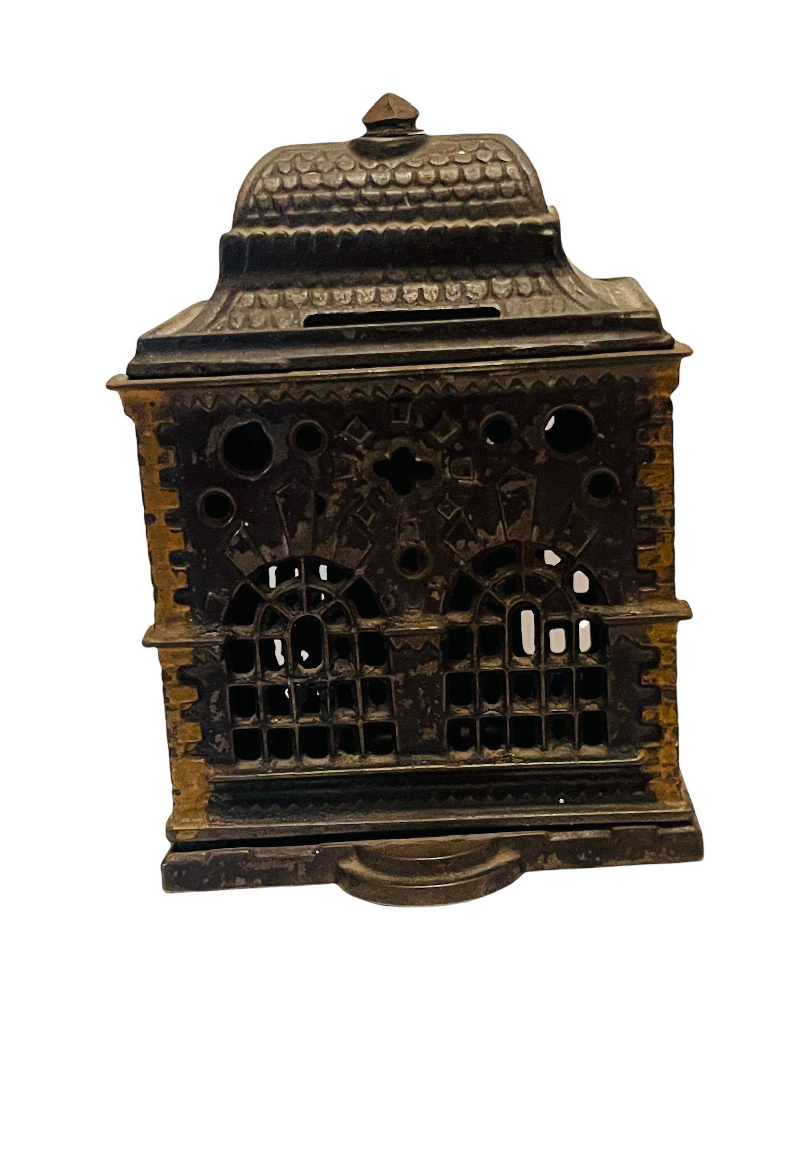 Roof Bank: Dark Japanned Finish Origin: Cromwell, CT Manufacturer: J. & E. Stevens Co. Material: Cast Iron Period: 1887