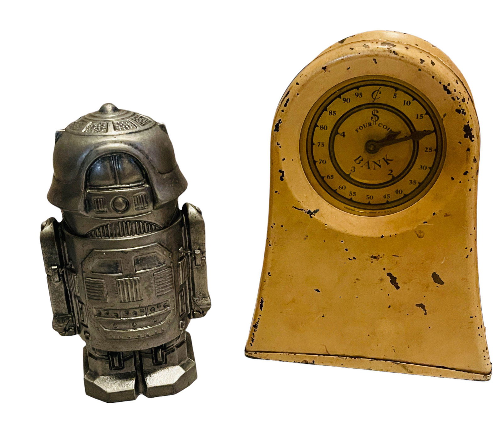 Robot Music Box Bank + "Your Coin" Registerring Bank: Robot Plays "It’s a Small World" Origin: American Manufacturer: Kingsbury & Pewtertone Material: Lead & Steel Period: 1930 & 1970