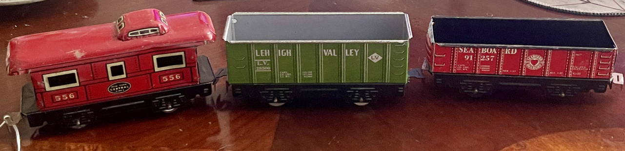 Three Tin Train Cars by Louis Marx include Lehigh: All are Excellent Condition and all are 6" Long Origin: New York City Manufacturer: Louis Marx Company Material: Tinplate Period: 1950's