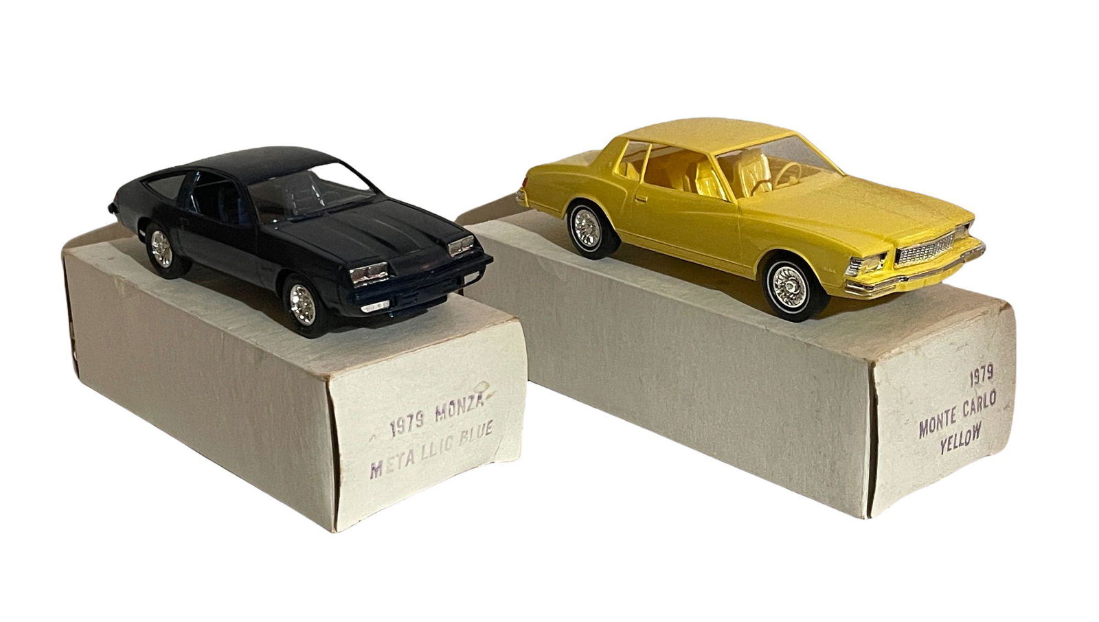 Two Plastic Model Cars: 1979  Monza Metallic Blue and (1 of 1)