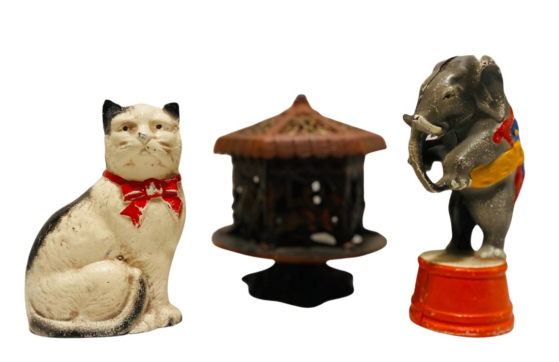 Lot of 3 John Wright Cast Iron Still Bank Replicas: Lot of 3 John Wright Cast Iron Still Bank Replicas from the 1960's - Circus Elephant, Merry Go Round & Seated Cat - Pennsylvania