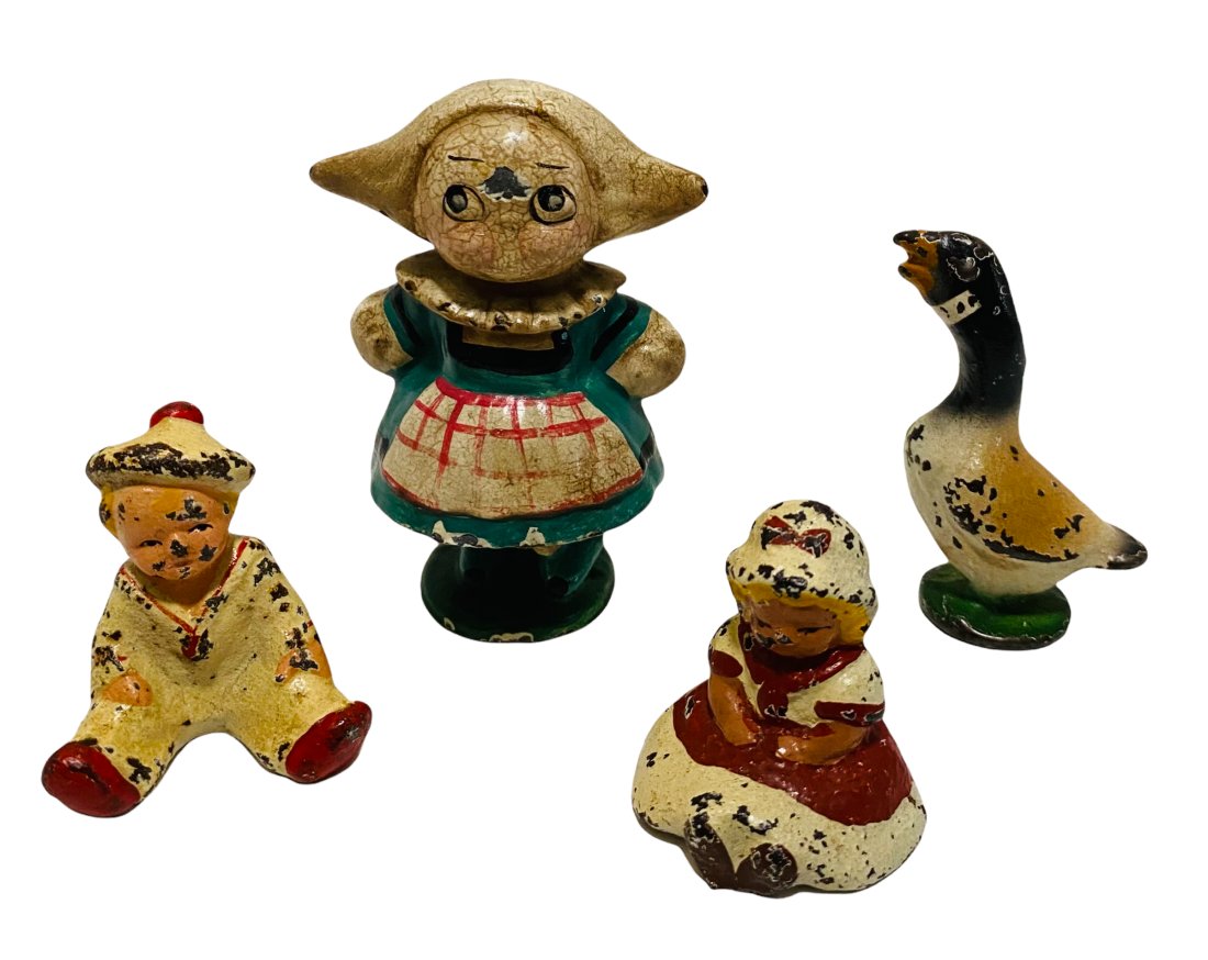 Four Small Cast Iron Figures By Hubley - Dutch Girl (1 of 2)