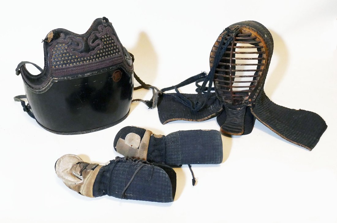 Vintage Japanese Kendo Armor: Vintage Japanese Kendo Armor. Circa 1940's-50's. Possibly brought back during WWII. Includes chest armor, helmet, and forearm/hand protector. Shipping: Available for in-house shipping. Please email us