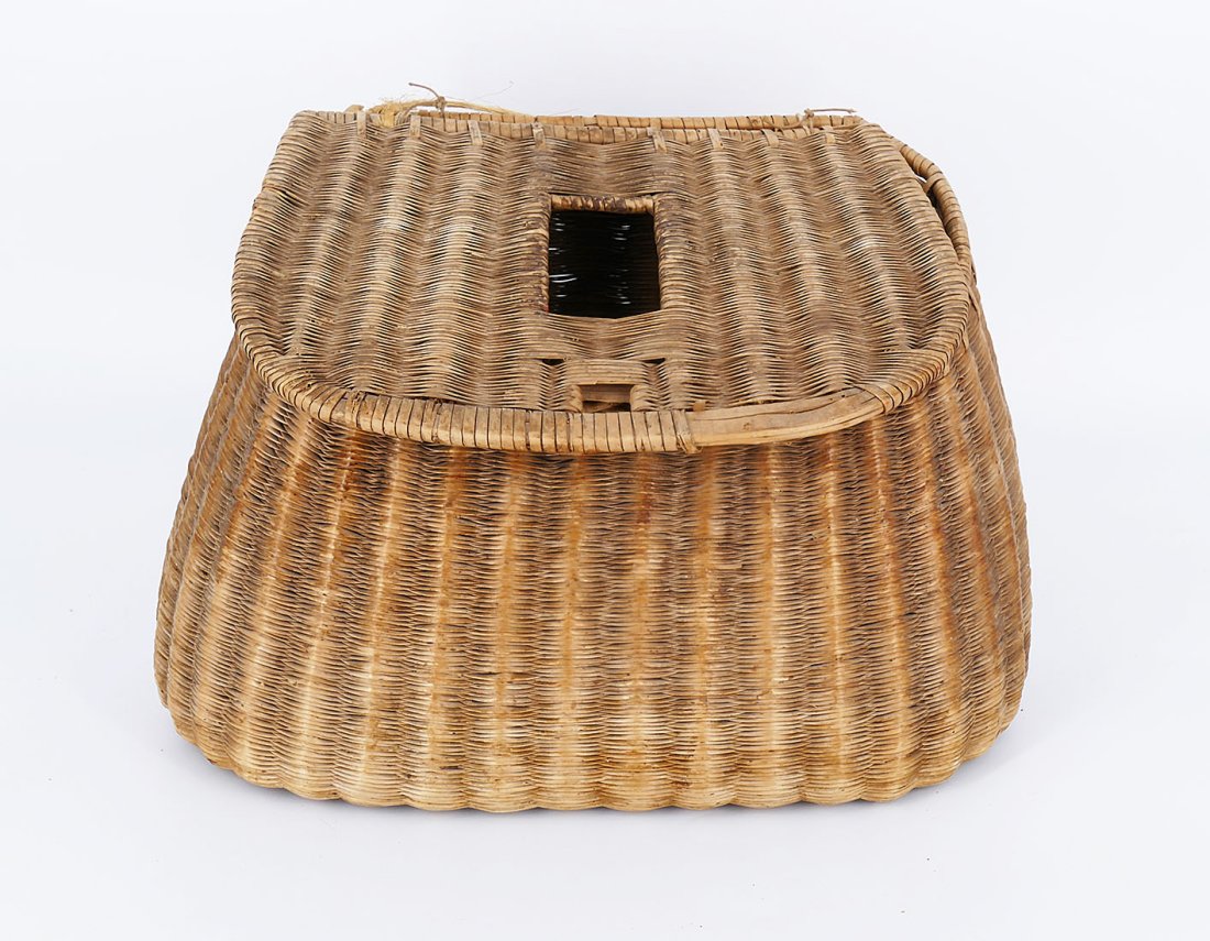 Wicker Fly Fishing Creel: Wicker Fly Fishing Creel. Nice display piece. Some repair to the back hinge. Measurements: 13" x 7" x 8.75"h Shipping: Available for in-house shipping. Please email us at ProvenanceAuctions@gmail.com 