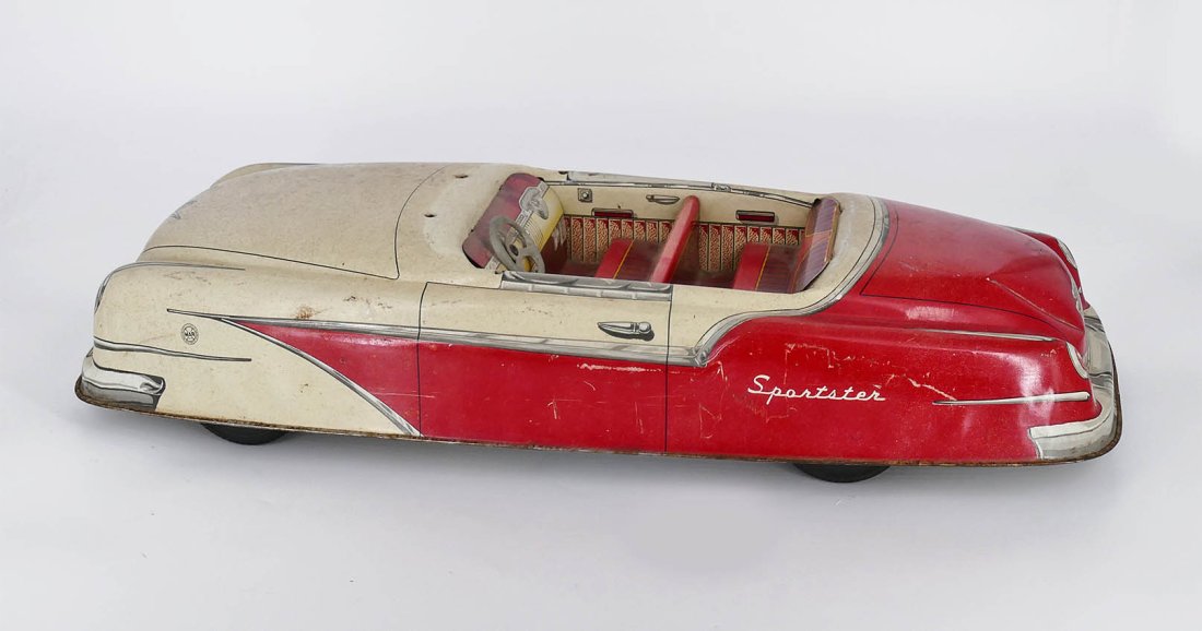 Marx Sportster Tin Litho Car: Marx Sportster Tin Litho Friction Car. Missing the windshield. Measurements: 19.75" x 7" x 4.5"h *This item is available for in-house shipping. Please email us at ProvenanceAuctions@gmail.com if you w