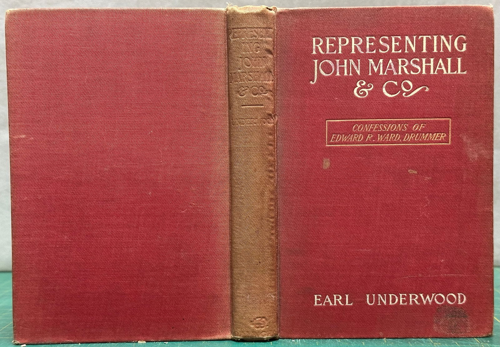 Humor REPRESENTING JOHN MARSHALL Underwood 1905 1st: Underwood, Earl. Representing John Marshall & Co : Being Confessions of Edward R Ward, Drummer. New York: G W Dillingham 1905. 1st Edition, 1st Printing. 171, 2 ad pages. Hardcover American Culture -