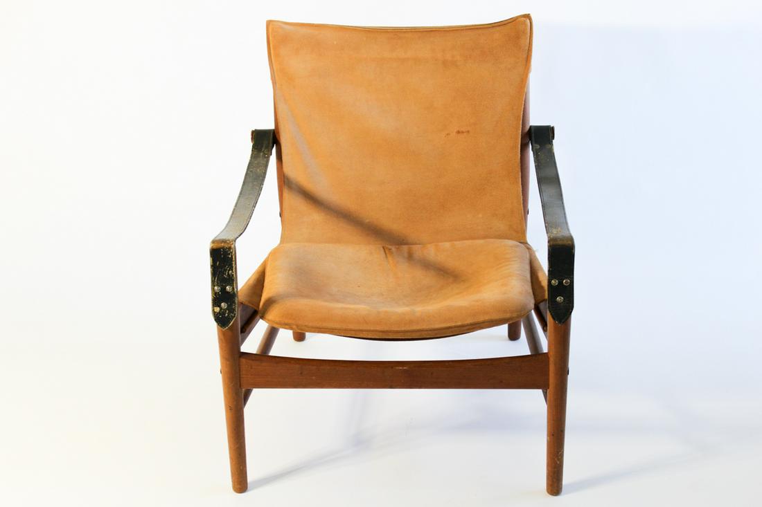 A Hans Olsen 1960s Safari Chair: A suede Hans Olsen 1960s Safari chair. Experimenting with both form and materials, Hans Olsen created his own distinctive style designing and producing a series of exciting pieces. From an Estate in A