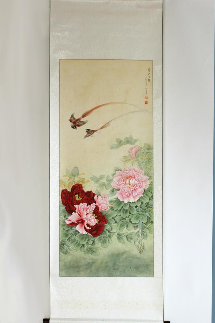A Chinese Scroll Painting by Wang Shukun: A Chinese Scroll Painting by Wang Shukun showing two sparrows flying above red and pink flowers.