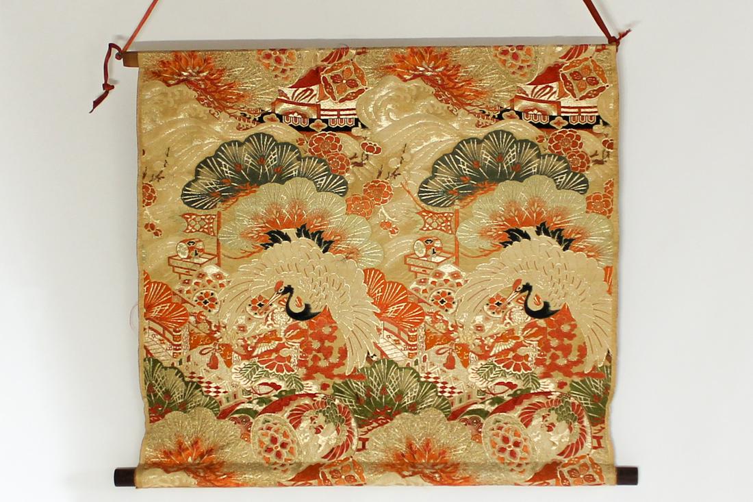 A Hanging Japanese Textile: A Hanging Japanese Textile of what appears to be swans in a nature scene.