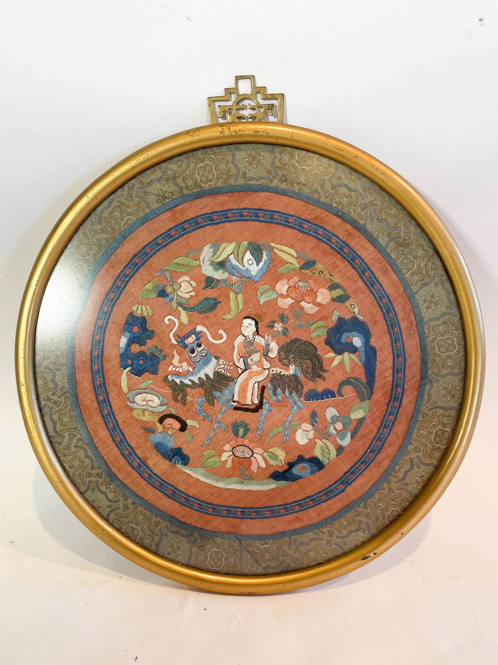 A Round Chinese Embroidery of Chi'Lin and a Boy: A Round Chinese Embroidery of Chi'Lin and a Boy. From the Annette Martin Collection. Exhibited at the Chinese Culture Foundation of San Francisco February 8th - March 8th 1975. Exhibit documentation a
