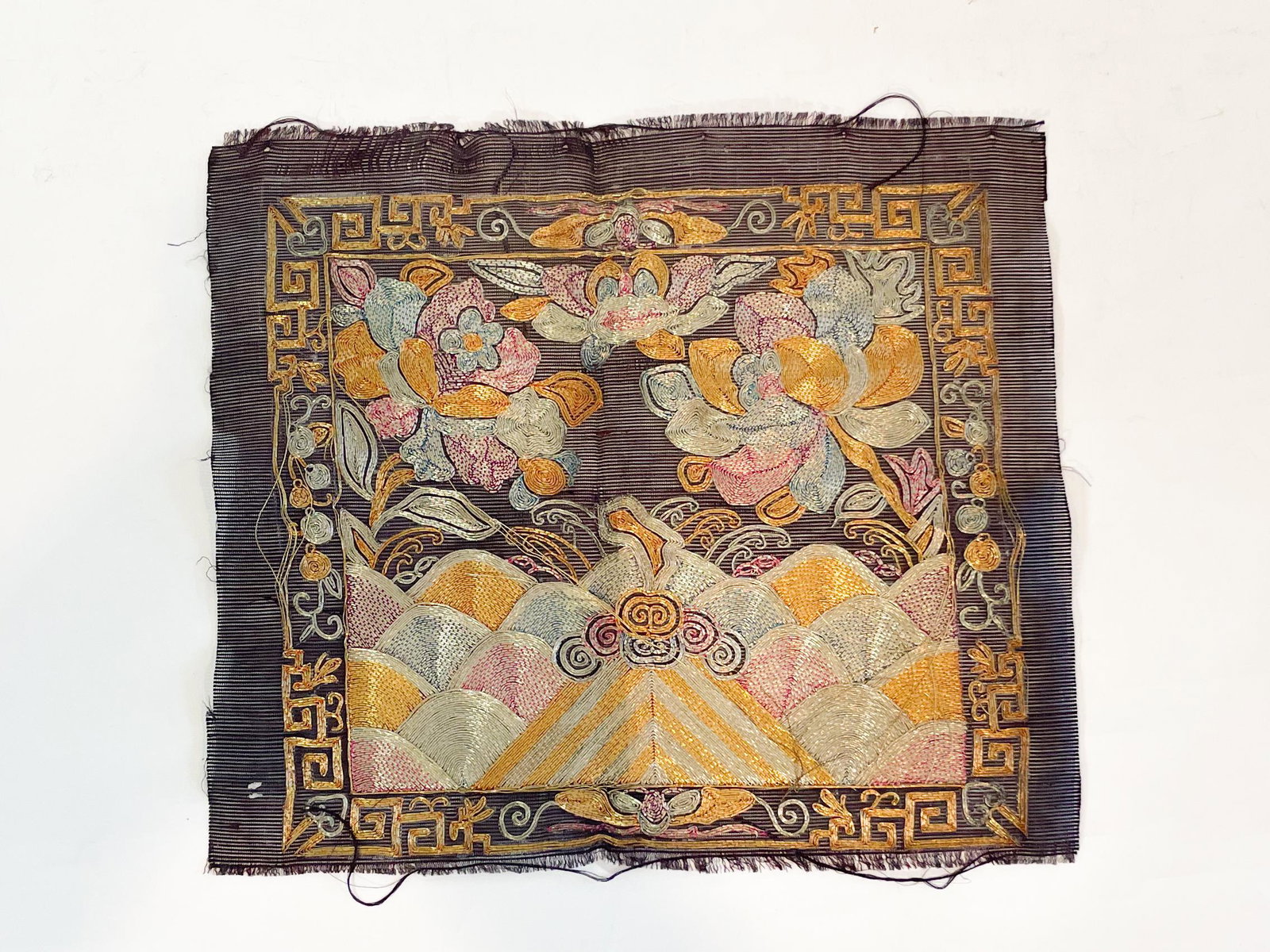 A Chinese Textile Badge: A Chinese Textile Badge made for an eunuch. From the Annette Martin Collection. Exhibited at the Chinese Culture Foundation of San Francisco February 8th - March 8th 1975. Exhibit documentation availa