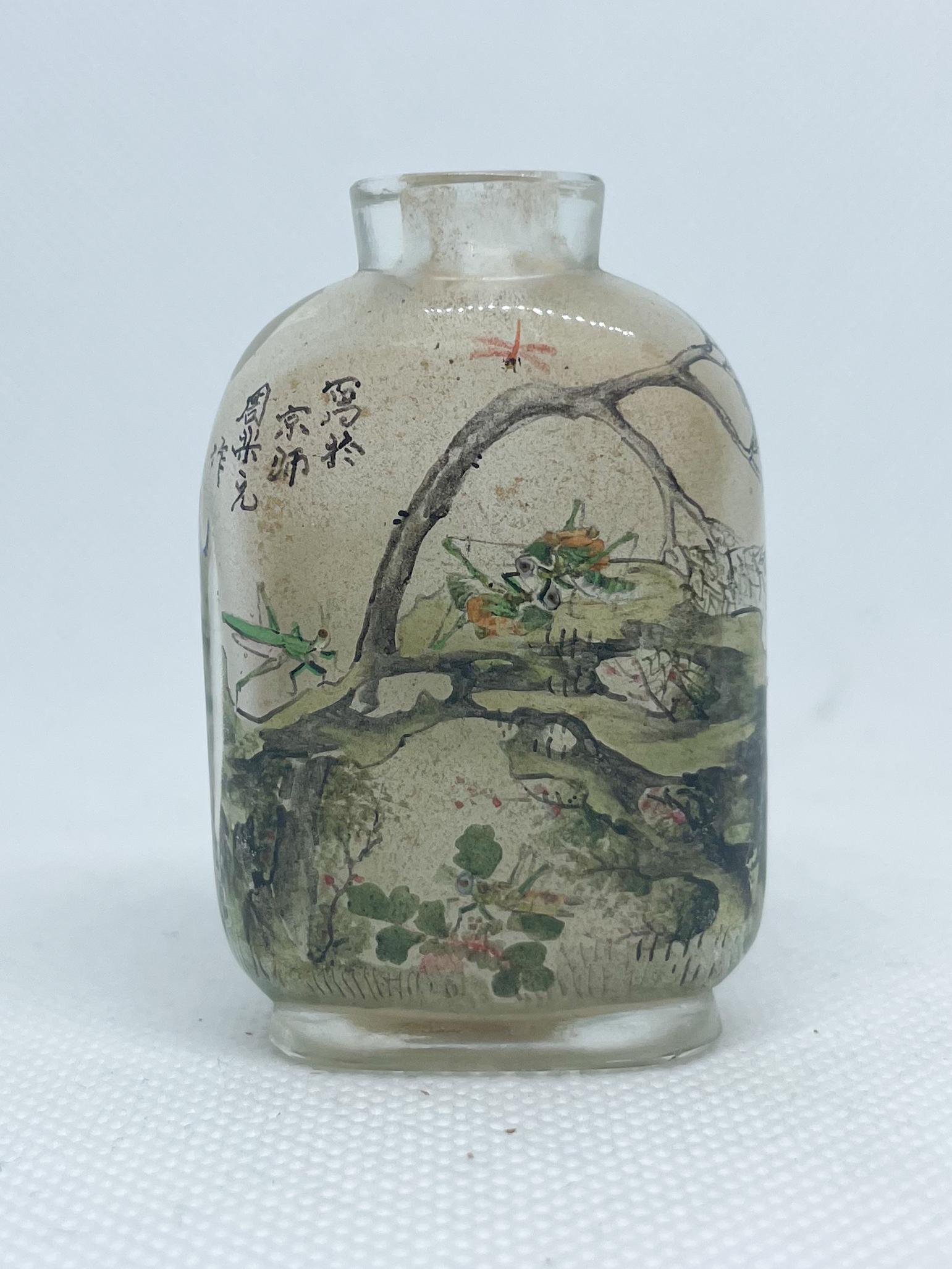 An Inside Painted Glass Snuff Bottle Signed Zhou Leyuan: An Inside Painted Glass Snuff Bottle Signed Zhou Leyuan. From a family collection originally in Halifax, Nova Scotia. Purchased in 1963.