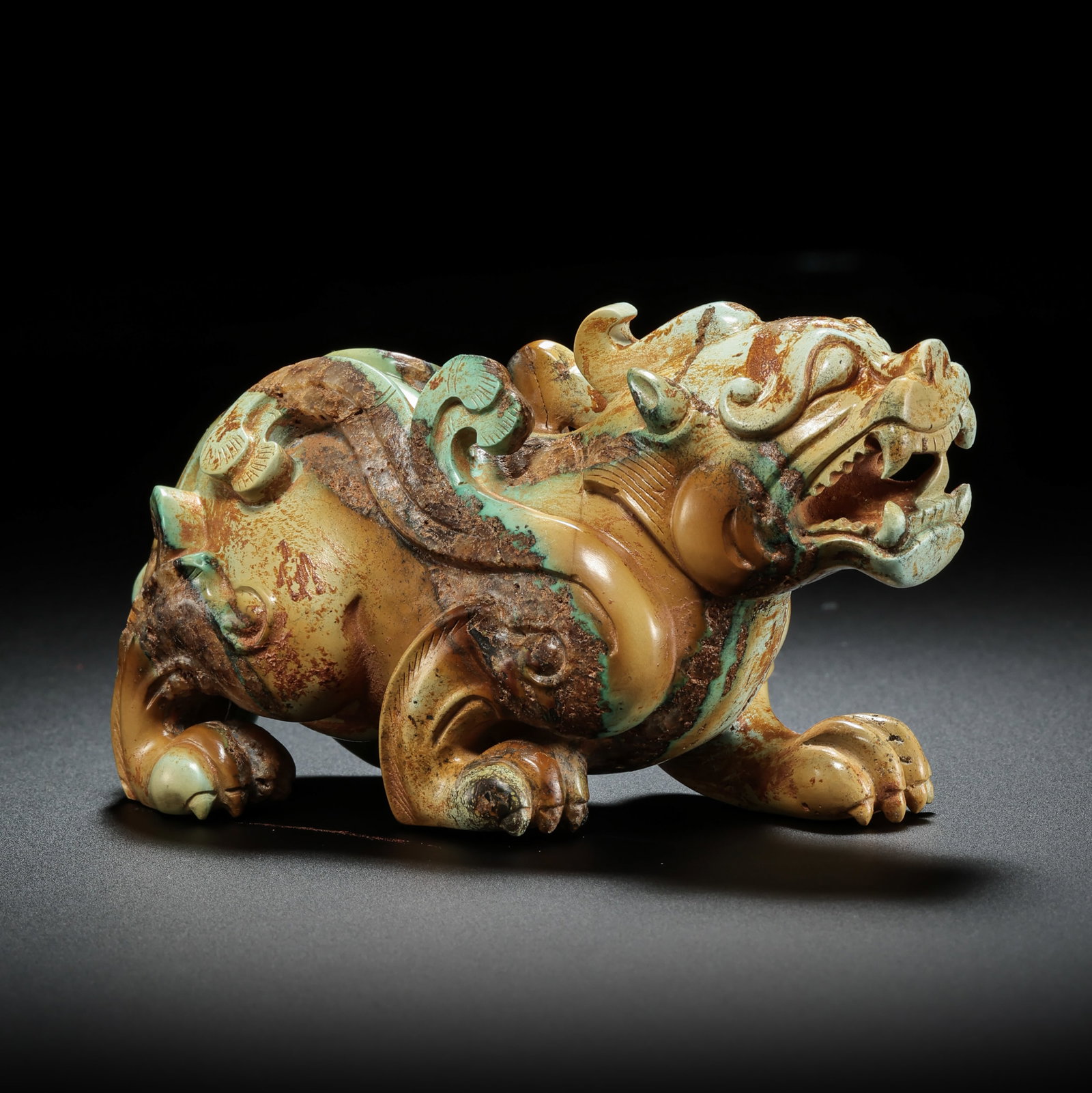 Pre-Ming Dynasty Turquoise Auspicious Beast Ornament: H. 7cm.W.11cm.weight. 293grams