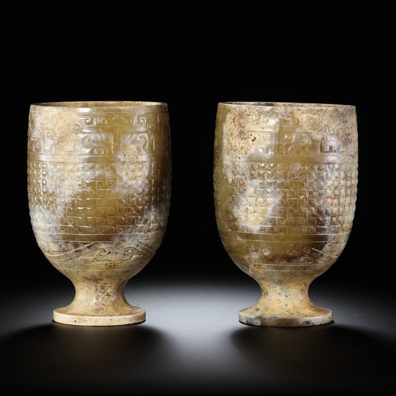 Pair of Pre-Ming Dynasty Hetian Jade Interlocking Grain Pattern High-Footed Cups: H. 12cm.W.7.5cm.weight.734grams
