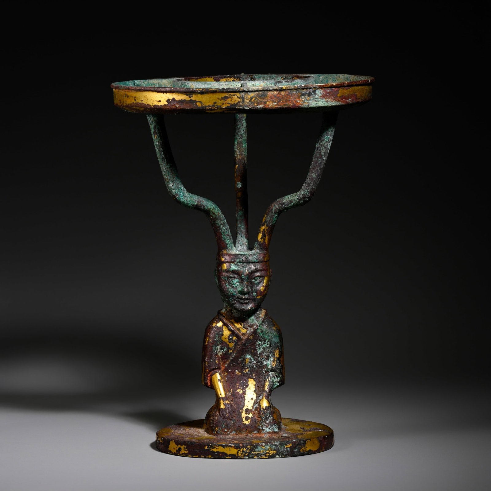 Pre-Ming Dynasty Gilt-Bronze Kneeling Figure Supporting a Lamp: H. 26cm.W.18.5cm.weight.2786grams