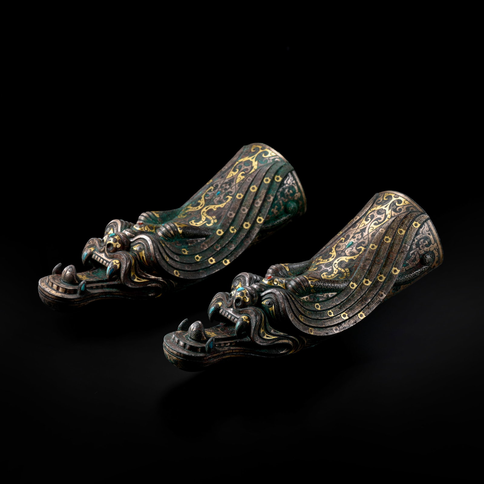Pair of Pre-Ming Dynasty Gold and Silver Inlaid Dragon-Head Fittings: H. 11cm.W.20cm.weight.3350grams