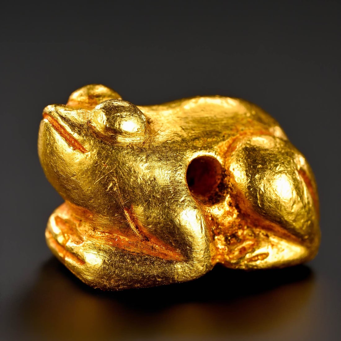 Pre-Ming Dynasty Gold Auspicious Beast Ornament: H. 0.95cm.W. 1.5cm.weight. 16.8 grams