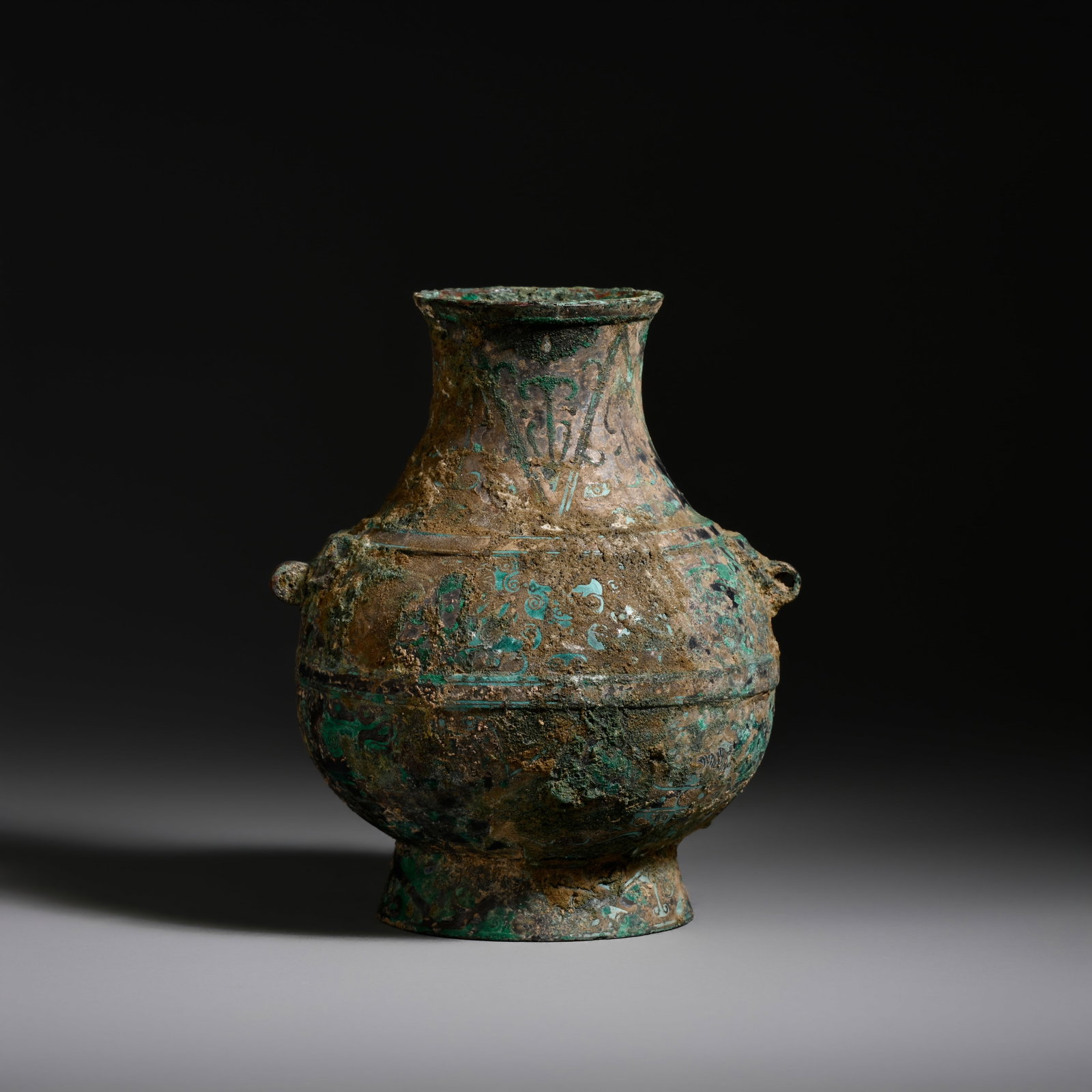 Pre-Ming Dynasty Bronze Double-Handled Appreciation Vase: H. 10.5 cm .W. 9.5cm .weight. 460grams