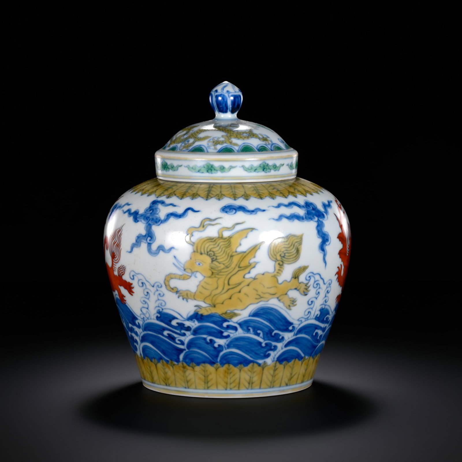 Qing Dynasty Underglaze Blue and Wucai (Five-Color) Sea Monster and Auspicious Lion Covered Jar: H. 16cm.W.13cm.