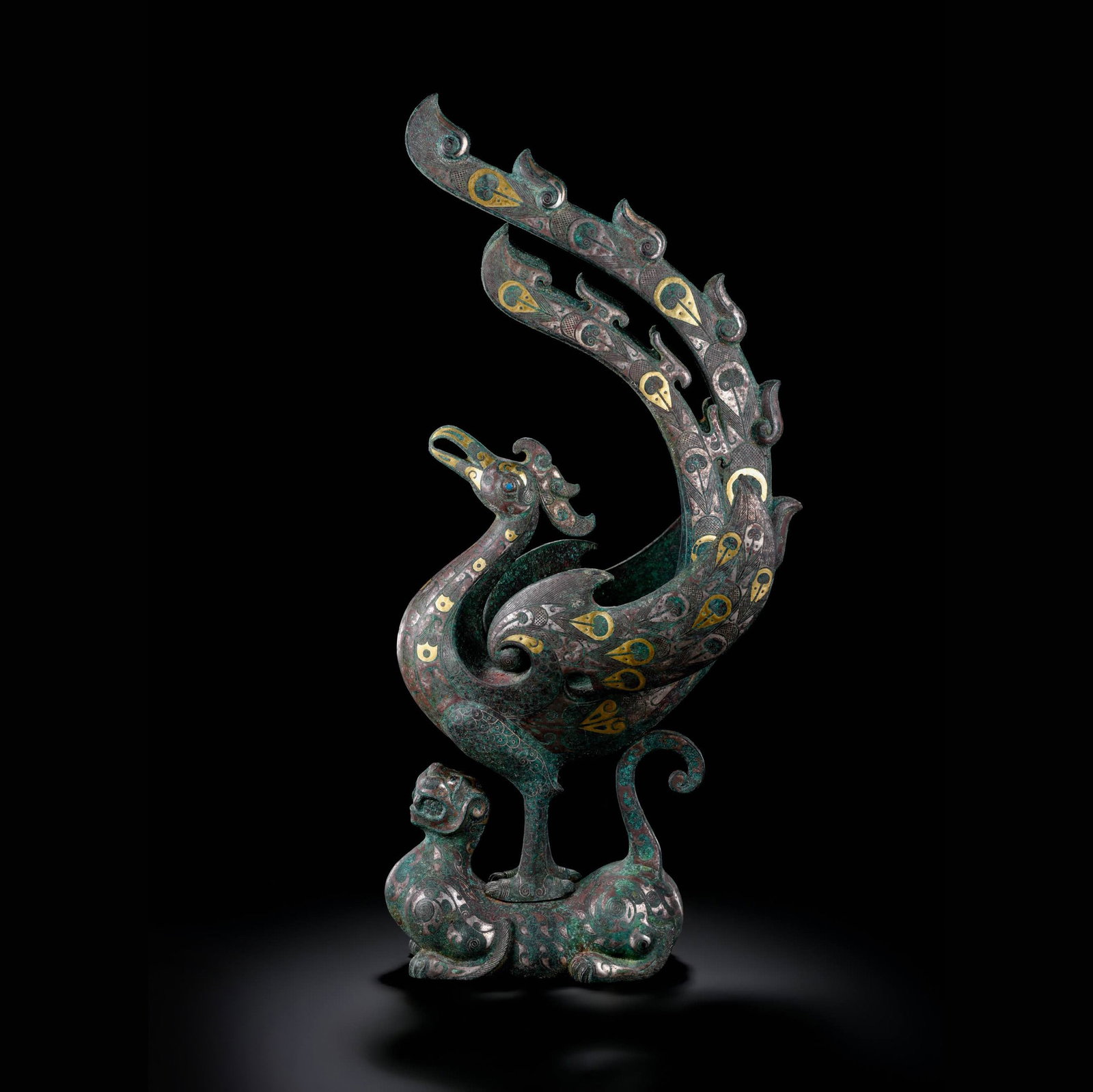 Pre-Ming Dynasty Gold and Silver Inlaid Auspicious Beast Supporting Phoenix Ornament: H. 34cm.W.16cm.weight.2380grams