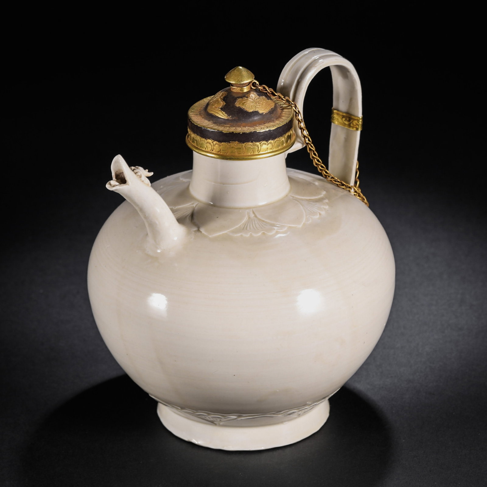 Pre-Ming Dynasty Ding Kiln Incised Dragon-Spout Gold-Covered Ewer: H. 19cm.W.17cm.