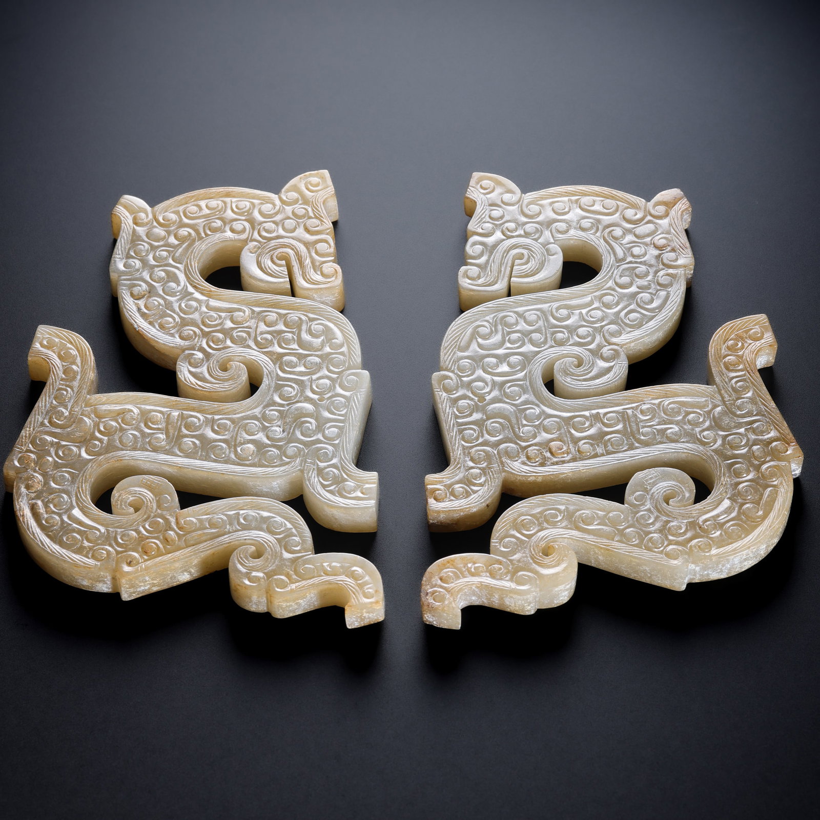 Pair of Pre-Ming Dynasty S-Shaped Dragon Pattern Jade Pendants: H. 11.2cm.W.7.8cm.weight. 2100grams