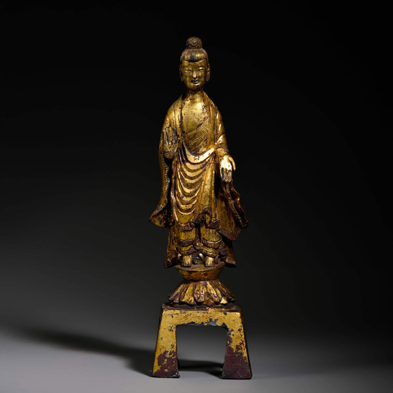 Pre-Ming Dynasty Gilt-Bronze Bench-Style Buddhist Statue: H. 27cm.W.7cm.weight. 880grams
