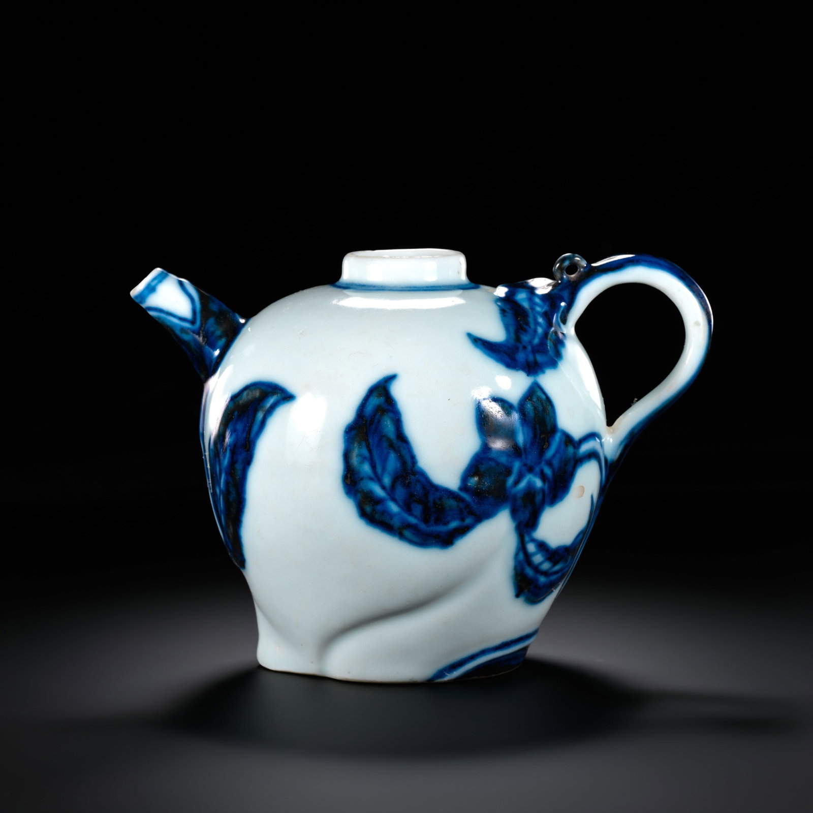 Qing Dynasty Underglaze Blue Longevity Peach Pattern Ewer: H. 12cm.W.17cm.