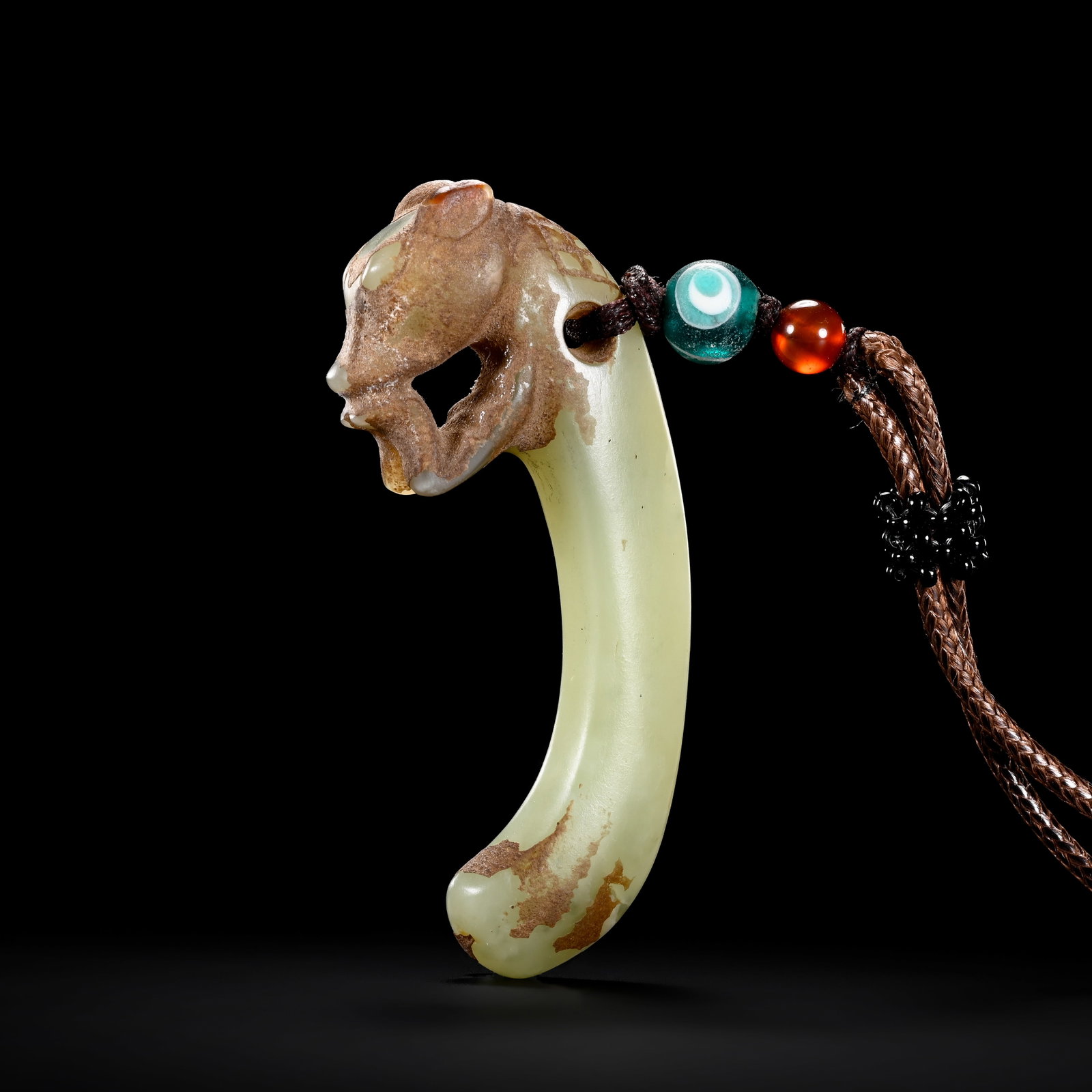 Pre-Ming Dynasty Yellow Jade Beast-Head Xi-Form Pendant: H. 6.5cm.W.3cm.weight.23.5grams