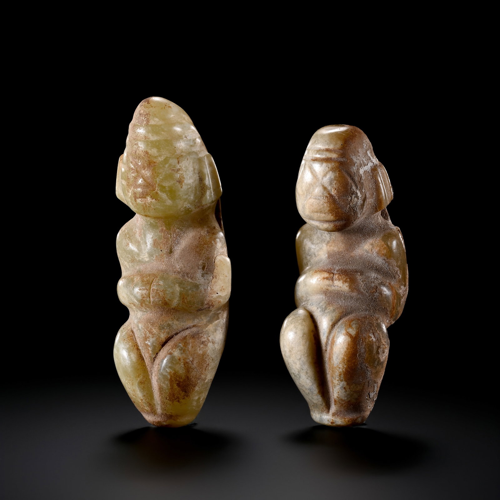 Pair of Pre-Ming Dynasty Hetian Jade Figures: H. 7.5cm.W.2.5cm.weight.146.5grams